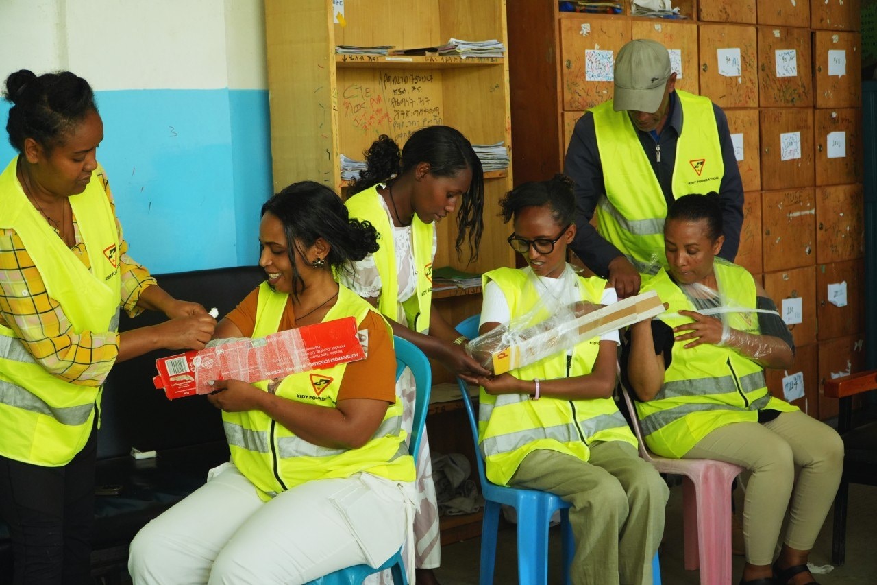 Kidy Foundation volunteers preparing collision-response supplies