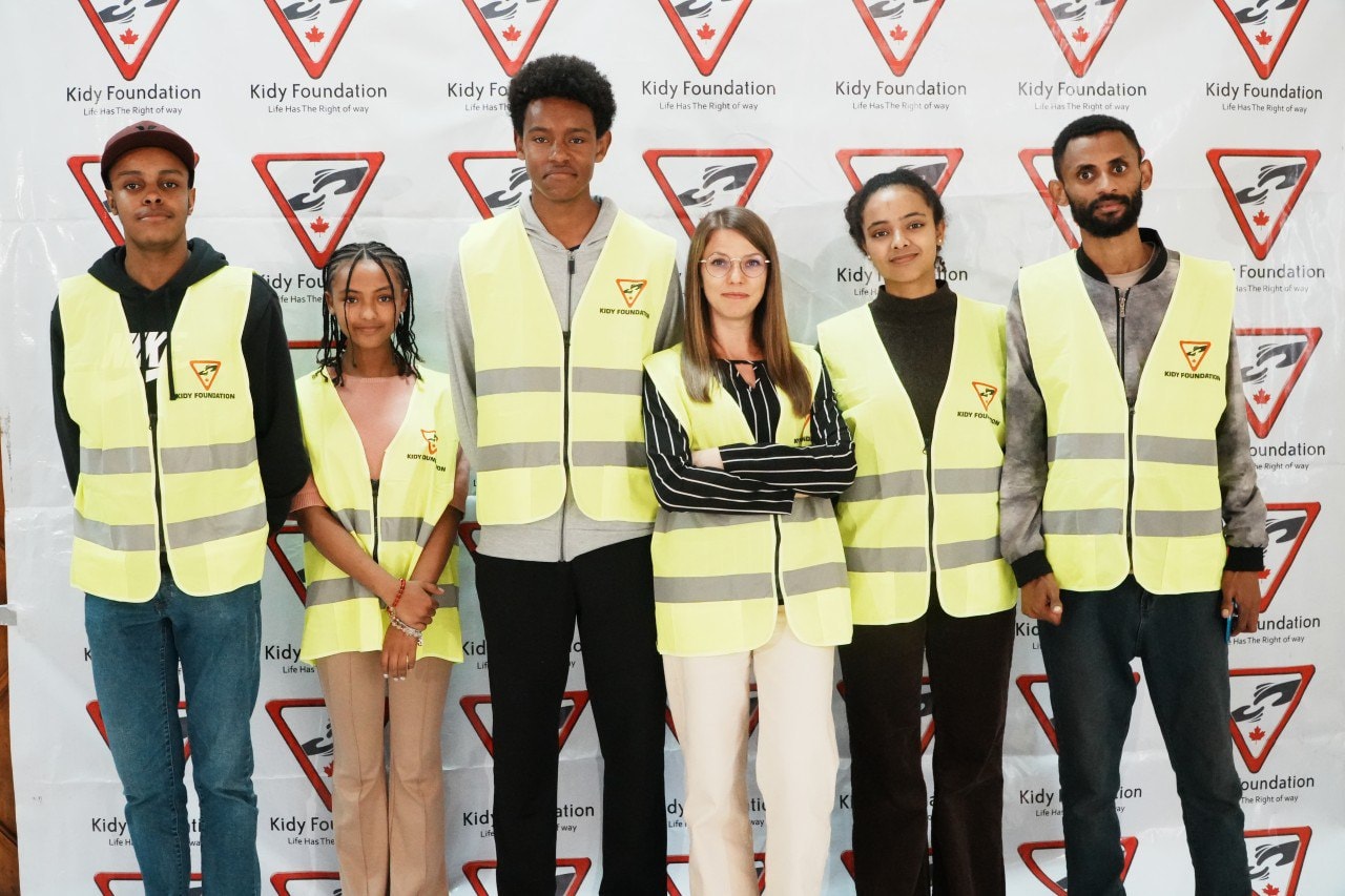Kidy Foundation volunteer team wearing road-safety vests