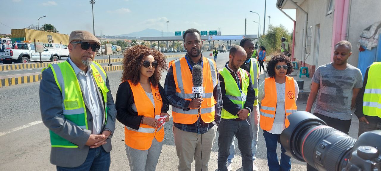 Kidy Foundation team members leading a roadside community-safety campaign